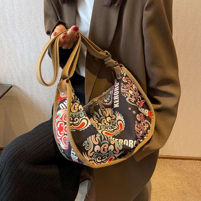 1706647878-416115121_1559814851525871_3931765338146515868_n Casual Messenger Crossbody Bag – Black & Brown Shoulder Bag - Image 1